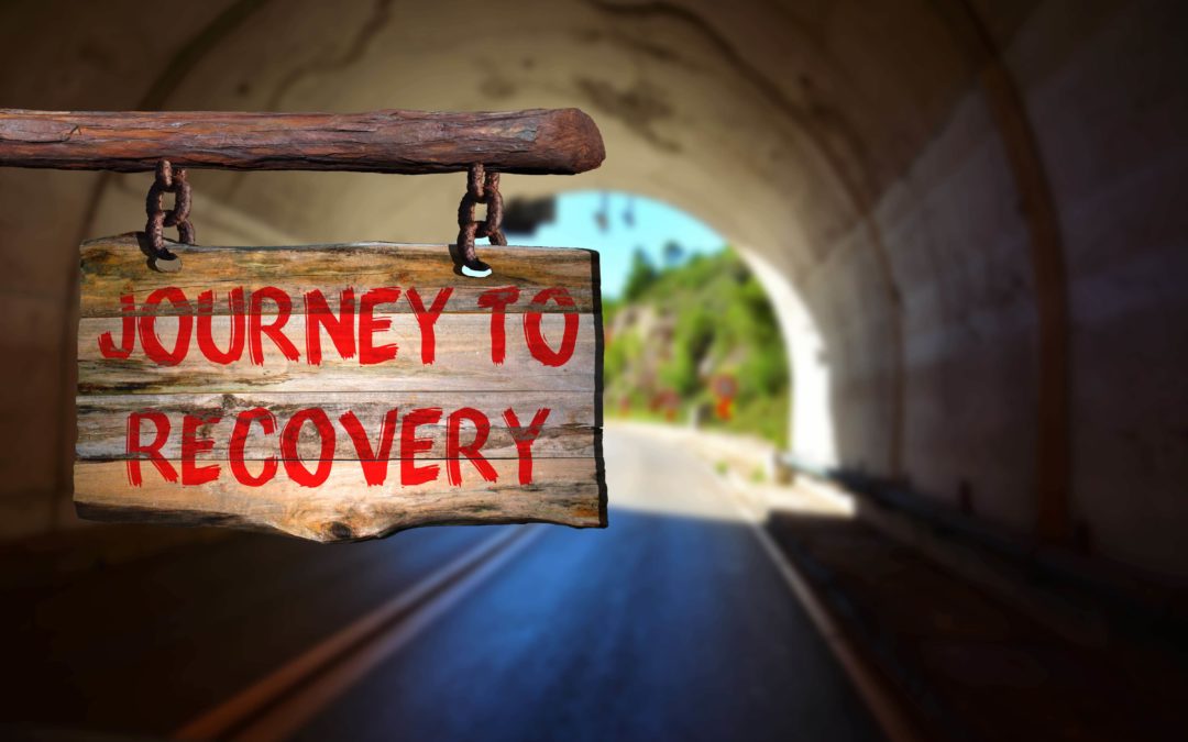 tunnel with journey to recovery sign