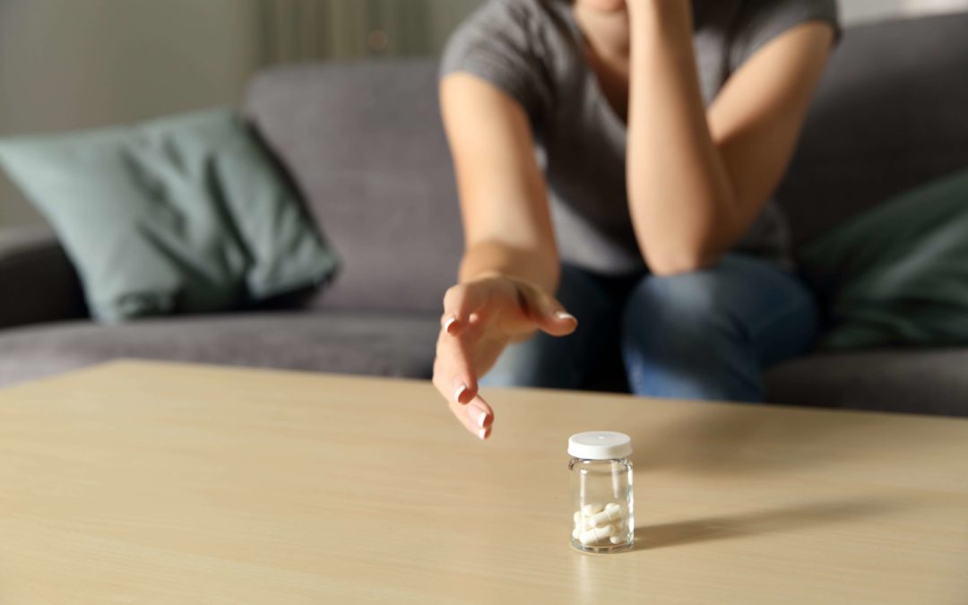 depressed woman self medicating with drugs