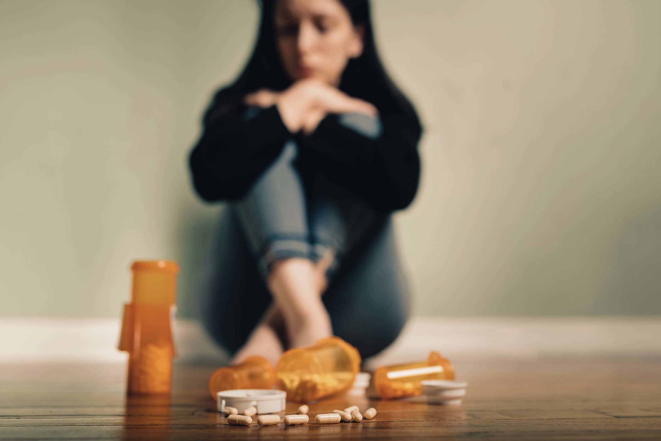 woman with anxiety considering taking drugs