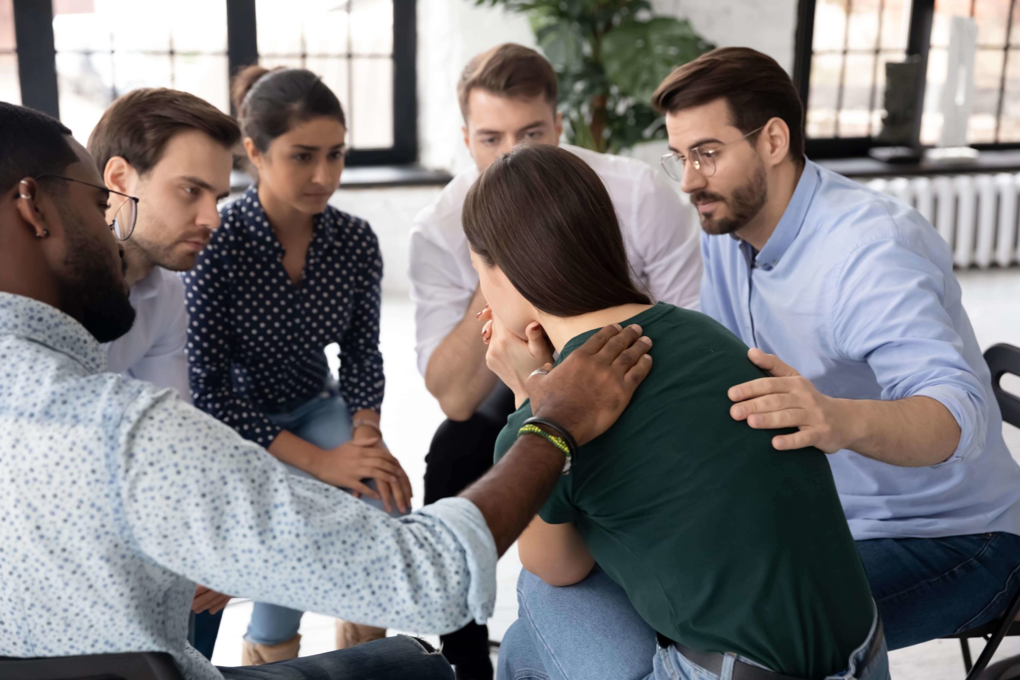 addict being supported by group in residential treatment