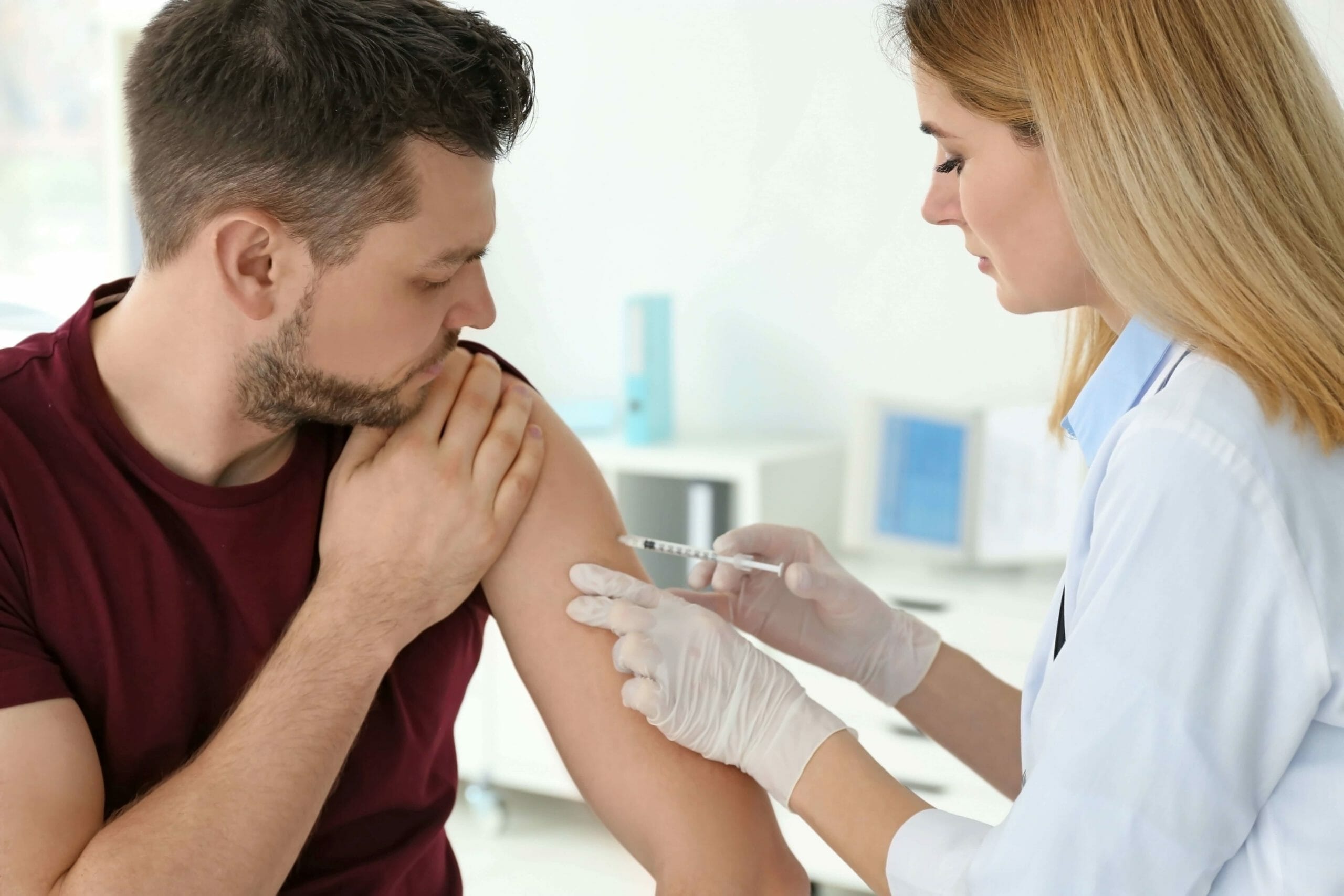 addict receiving Vivitrol injection from a doctor