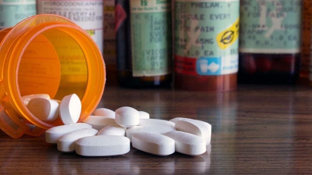 prescription opioids with many bottles of pills