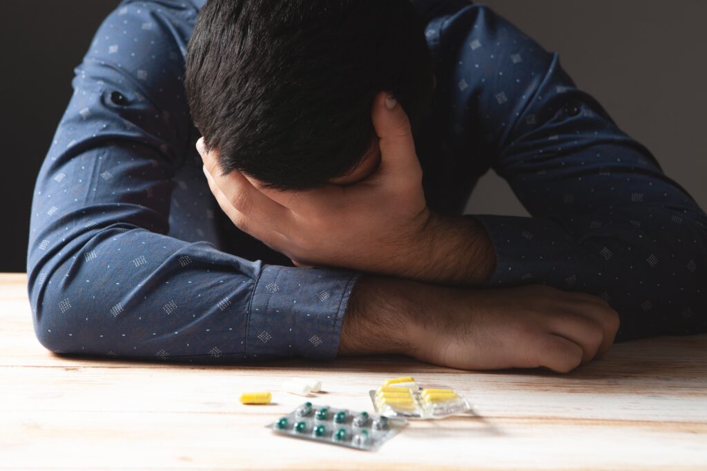 man struggling with drug cravings