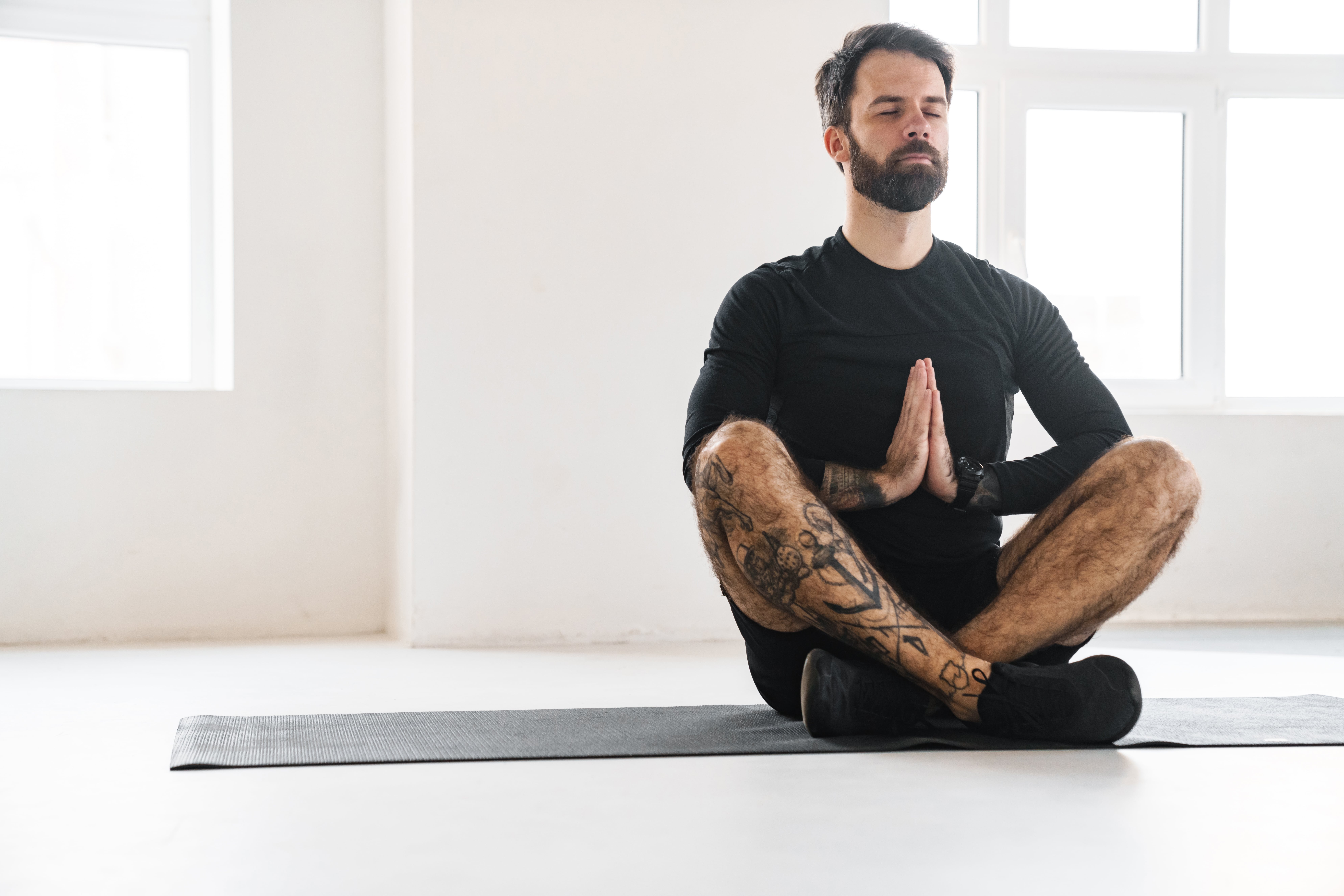 man in recovery practicing yoga